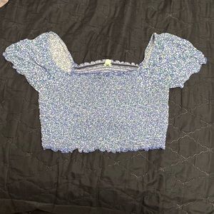 A cropped top with short sleeves